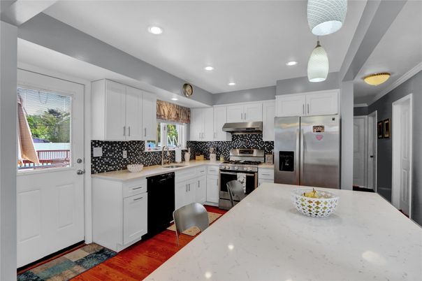 Interior, Kitchen, Pendant Lights, Recessed Lighting, Stainless Steel Appliances, Wood Texture Flooring