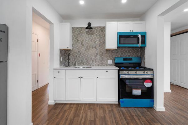 Interior, Kitchen, Recessed Lighting, Stainless Steel Appliances, Wood Texture Flooring