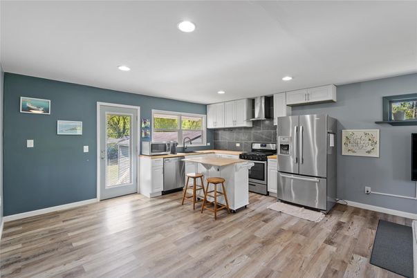 Interior, Kitchen, Recessed Lighting, Stainless Steel Appliances, Wood Texture Flooring