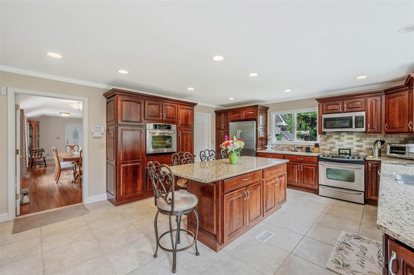 Dining room, Interior, Kitchen, Recessed Lighting, Stainless Steel Appliances, Wood Texture Flooring