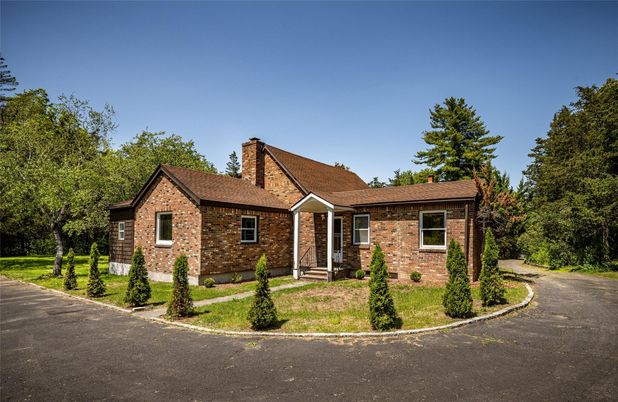 Exterior, Facade, Brick Facade, Tudor Revival