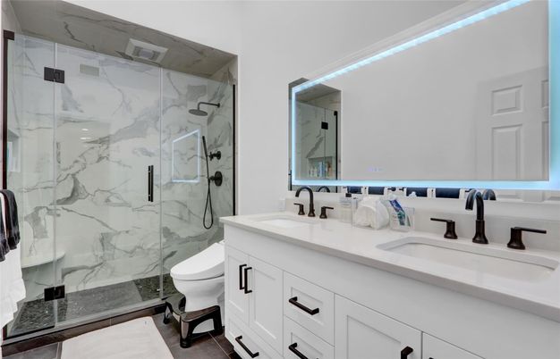 Bathroom, Dual Sink Vanities, Glass Shower, Interior, Marble Walls