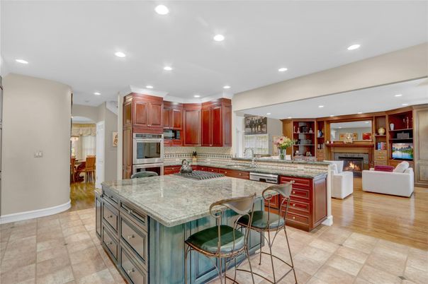 Fireplace, Interior, Kitchen, Living room, Recessed Lighting, Stainless Steel Appliances, Wood Texture Flooring