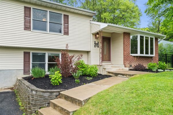 Exterior, Facade, Brick Facade, Raised Ranch