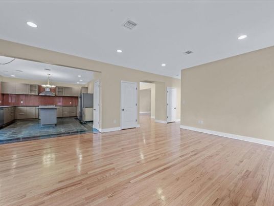 Chandelier, Empty room, Interior, Kitchen, Recessed Lighting, Stainless Steel Appliances, Wood Texture Flooring