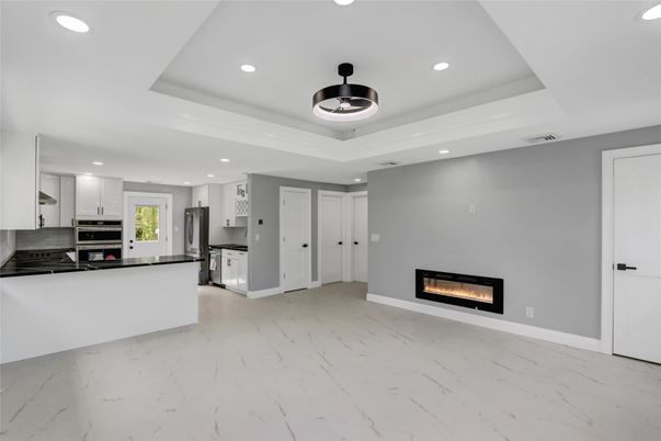 Fireplace, Interior, Kitchen, Marble, Recessed Lighting, Stainless Steel Appliances