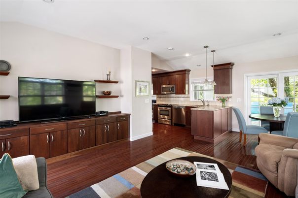 Dining room, Interior, Kitchen, Pendant Lights, Recessed Lighting, Stainless Steel Appliances, Wood Texture Flooring