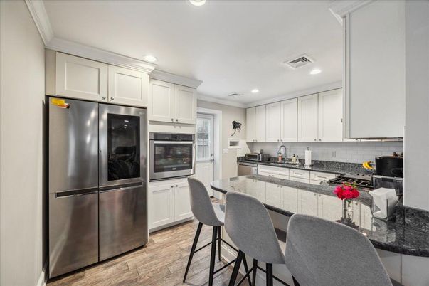 Interior, Kitchen, Recessed Lighting, Stainless Steel Appliances, Wood Texture Flooring