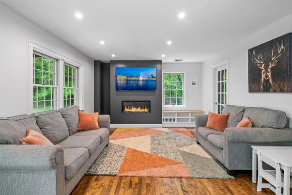 Fireplace, Interior, Living room, Recessed Lighting, Wood Texture Flooring