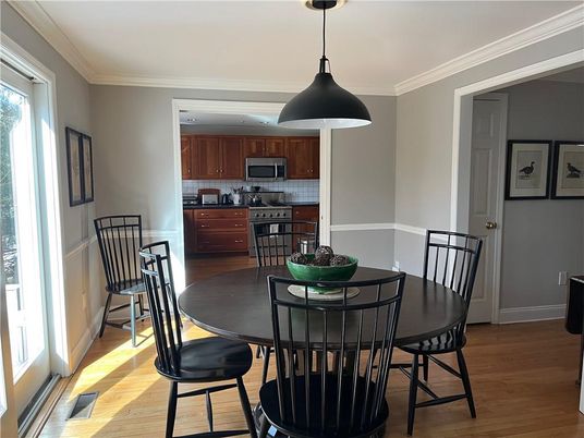 Dining room, Interior, Kitchen, Pendant Lights, Stainless Steel Appliances, Wood Texture Flooring