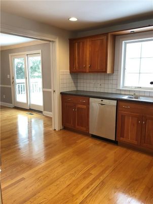 Interior, Kitchen, Recessed Lighting, Tile Countertops, Wood Texture Flooring