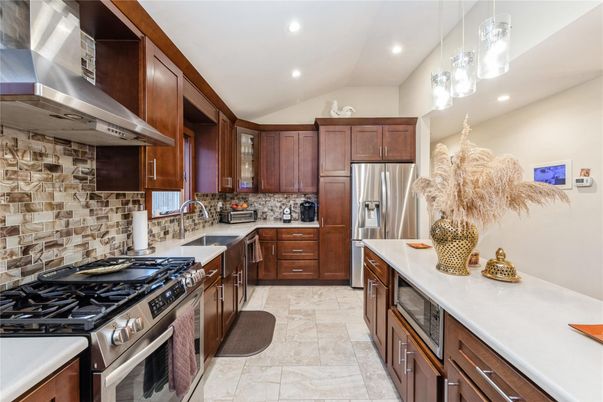 Interior, Kitchen, Recessed Lighting, Stainless Steel Appliances, Stone Walls