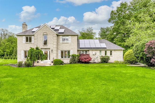 Backyard, Exterior, Facade, Brick Facade, Solar Panels, French Provincial