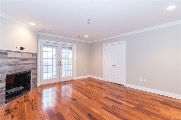 Empty room, Fireplace, Interior, Recessed Lighting, Wood Texture Flooring