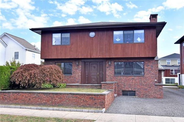 Exterior, Facade, Brick Facade, Raised Ranch