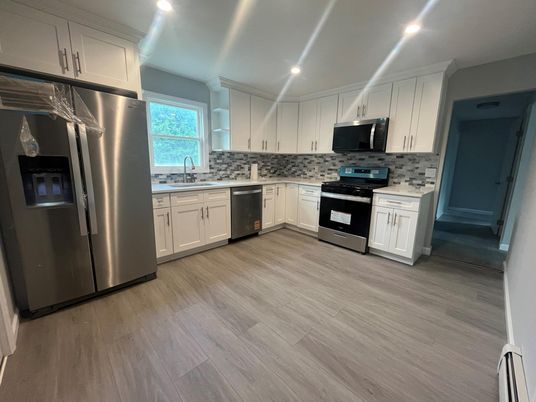 Interior, Kitchen, Recessed Lighting, Stainless Steel Appliances, Wood Texture Flooring