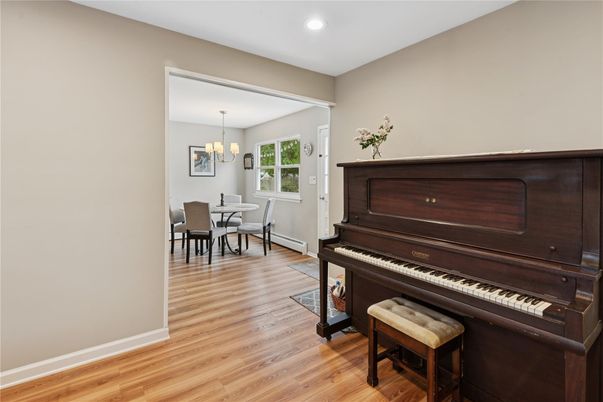 Chandelier, Dining room, Interior, Piano, Recessed Lighting, Wood Texture Flooring