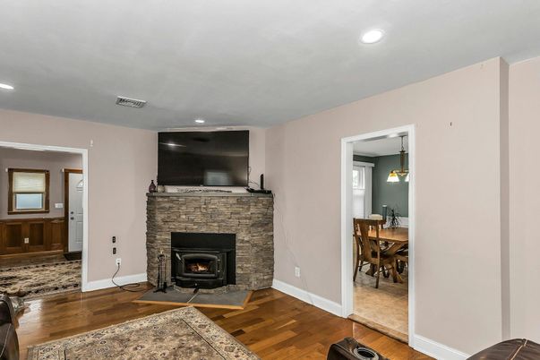 Dining room, Fireplace, Interior, Pendant Lights, Recessed Lighting, Wood Texture Flooring