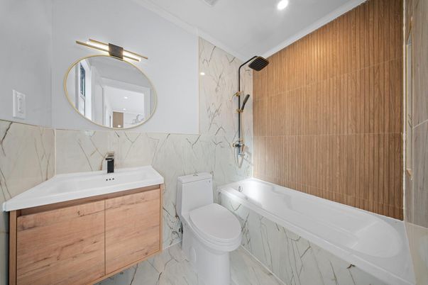 Bathroom, Dual Sink Vanities, Interior, Marble, Marble Walls, Recessed Lighting