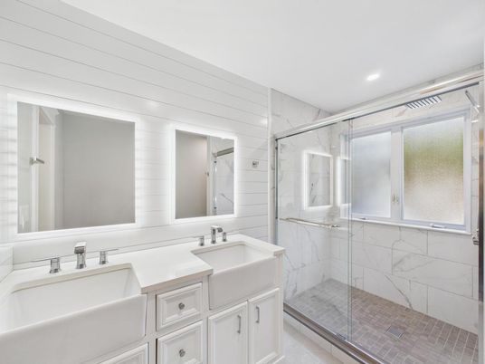Bathroom, Dual Sink Vanities, Glass Shower, Interior, Marble Walls, Recessed Lighting