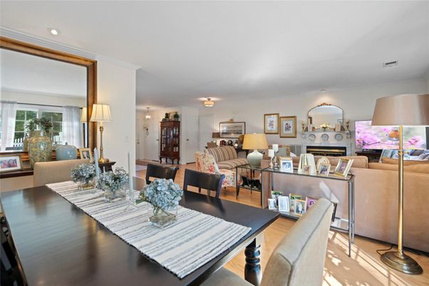 Dining room, Fireplace, Interior, Living room, Recessed Lighting, Wood Texture Flooring