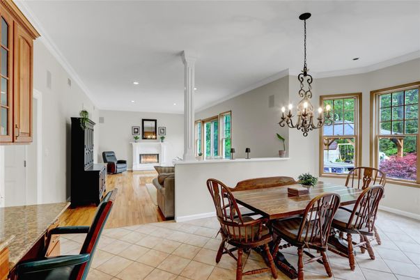 Chandelier, Dining room, Fireplace, Interior, Living room, Recessed Lighting, Wood Texture Flooring