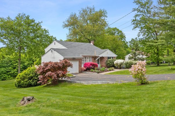 Attached, Backyard, Exterior, Facade, Brick Facade, Cape Cod