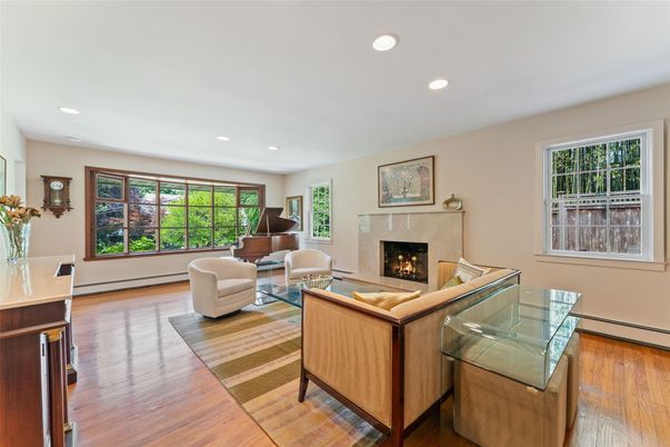 Fireplace, Interior, Living room, Piano, Recessed Lighting, Wood Texture Flooring