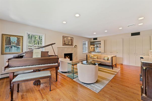 Fireplace, Interior, Living room, Piano, Recessed Lighting, Wood Texture Flooring