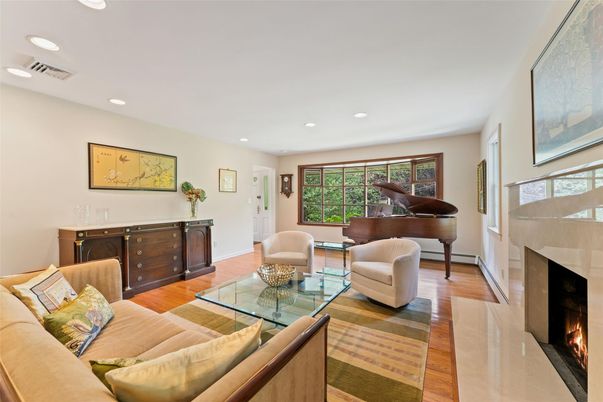 Fireplace, Interior, Living room, Piano, Recessed Lighting, Wood Texture Flooring