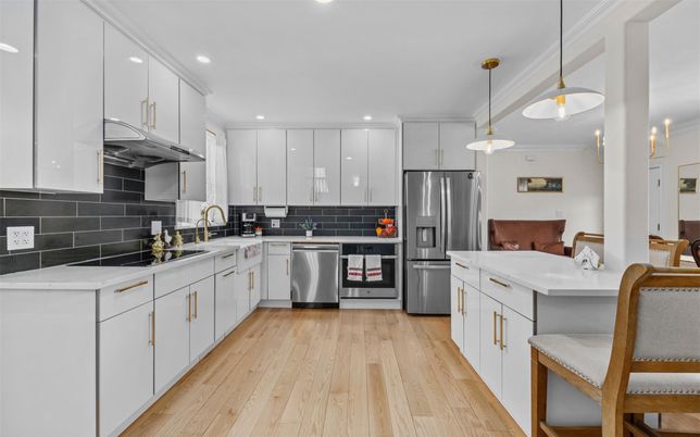 Interior, Kitchen, Pendant Lights, Recessed Lighting, Stainless Steel Appliances, Wood Texture Flooring
