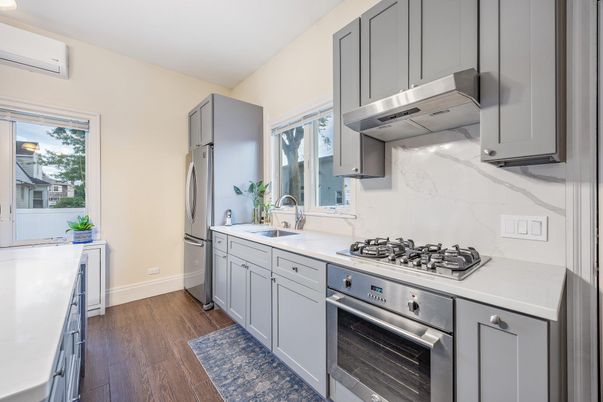 Interior, Kitchen, Marble Walls, Stainless Steel Appliances, Wood Texture Flooring