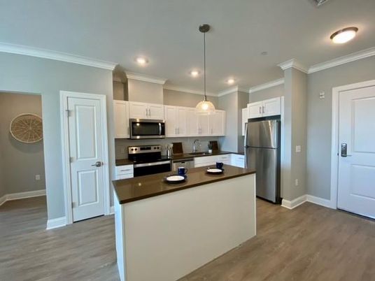 Interior, Kitchen, Pendant Lights, Recessed Lighting, Stainless Steel Appliances, Wood Texture Flooring