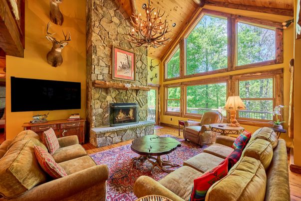 Chandelier, Fireplace, Interior, Living room, Stone Walls, Wooden Beams, Wooden Ceilings, Wood Texture Flooring