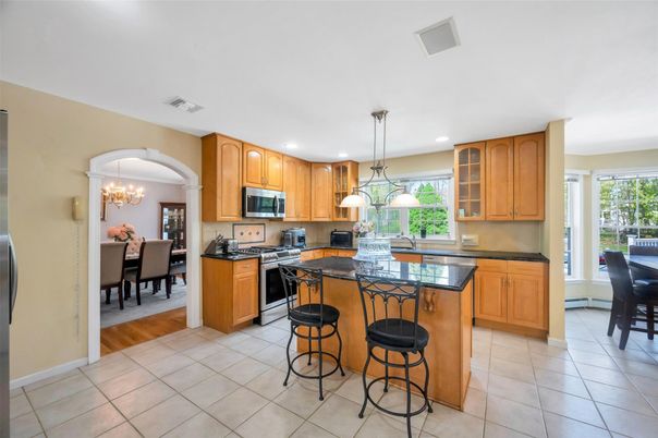 Chandelier, Dining room, Interior, Kitchen, Pendant Lights, Recessed Lighting, Stainless Steel Appliances, Wood Texture Flooring