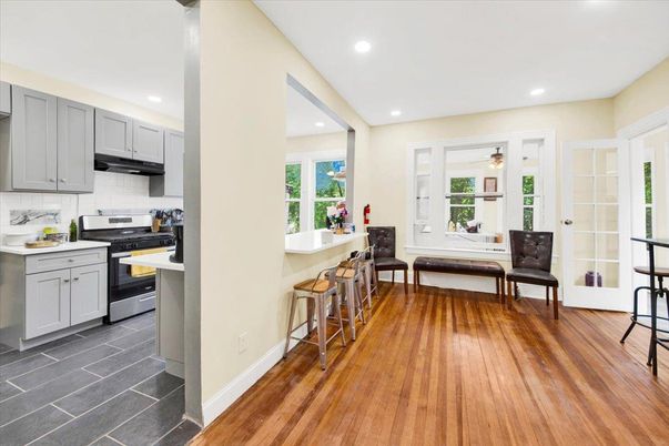 Dining room, Interior, Kitchen, Recessed Lighting, Stainless Steel Appliances, Wood Texture Flooring