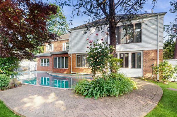Exterior, Facade, Brick Facade, Pool, Split Level