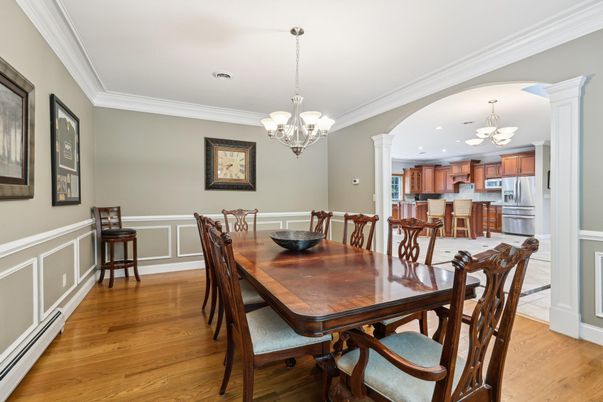 Chandelier, Dining room, Interior, Kitchen, Recessed Lighting, Stainless Steel Appliances, Wood Texture Flooring
