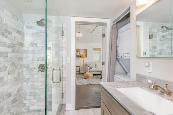 Bathroom, Glass Shower, Interior, Marble Walls, Wood Texture Flooring