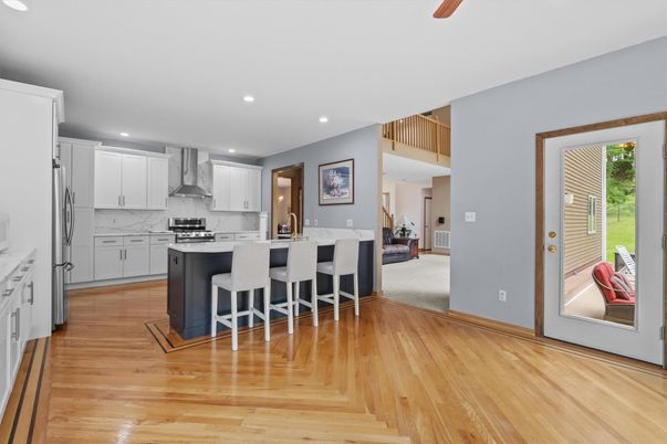 Interior, Kitchen, Marble Walls, Recessed Lighting, Wood Texture Flooring