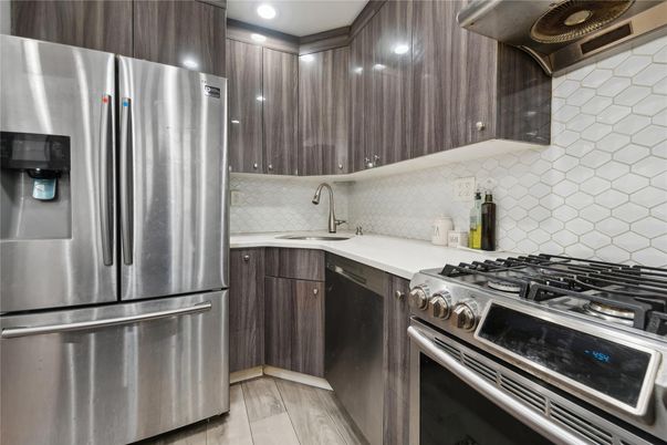Interior, Kitchen, Recessed Lighting, Stainless Steel Appliances, Wood Texture Flooring