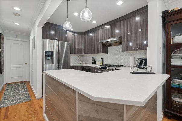 Interior, Kitchen, Pendant Lights, Recessed Lighting, Stainless Steel Appliances, Wood Texture Flooring