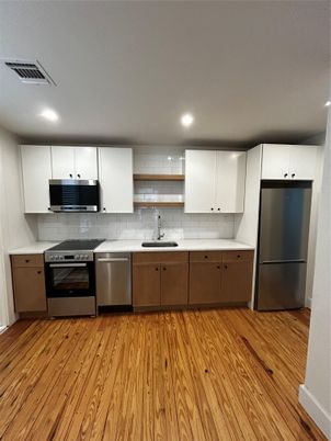 Interior, Kitchen, Recessed Lighting, Stainless Steel Appliances, Wood Texture Flooring