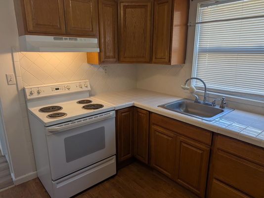 Interior, Kitchen, Tile Countertops, Wood Texture Flooring