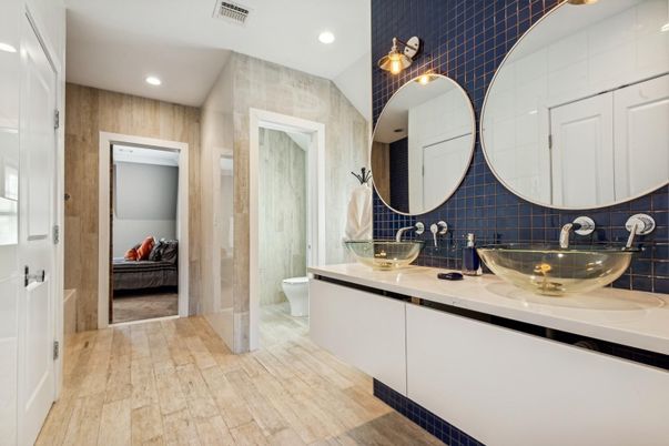 Bathroom, Dual Sink Vanities, Interior, Recessed Lighting, Wood Texture Flooring
