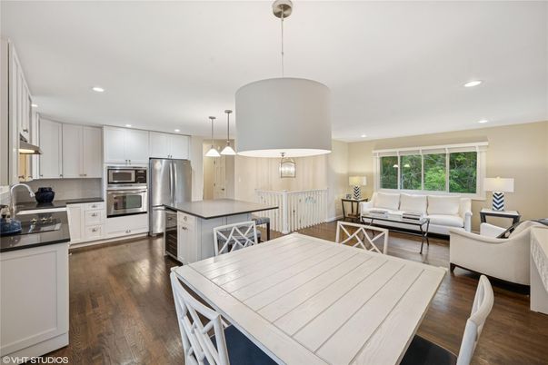 Dining room, Interior, Kitchen, Living room, Pendant Lights, Recessed Lighting, Stainless Steel Appliances, Wood Texture Flooring