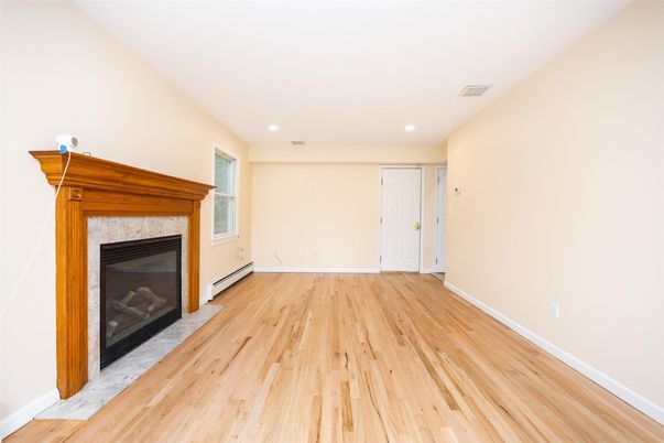 Empty room, Fireplace, Interior, Recessed Lighting, Wood Texture Flooring