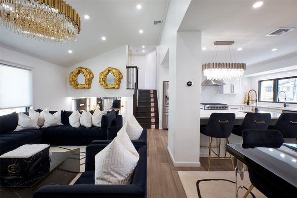 Chandelier, Interior, Kitchen, Living room, Marble Walls, Pendant Lights, Recessed Lighting, Stainless Steel Appliances, Wood Texture Flooring