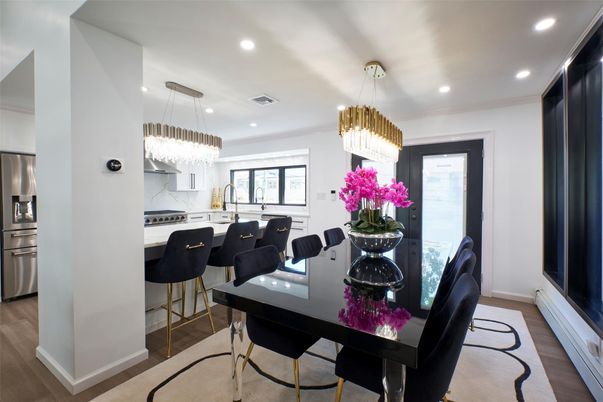 Chandelier, Dining room, Interior, Kitchen, Pendant Lights, Recessed Lighting, Stainless Steel Appliances, Wood Texture Flooring