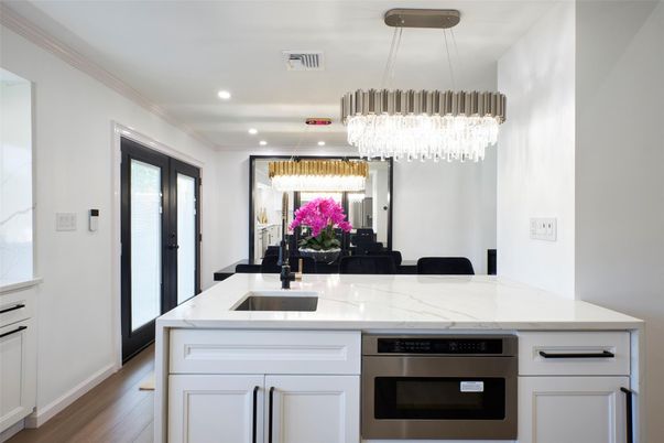 Chandelier, Interior, Kitchen, Pendant Lights, Recessed Lighting, Stainless Steel Appliances, Wood Texture Flooring